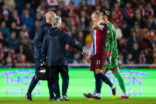 Andreas Hanche-Olsen of Norway in pain
