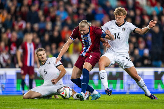 Erling Braut Haaland of Norway scores 2-1 while compete for