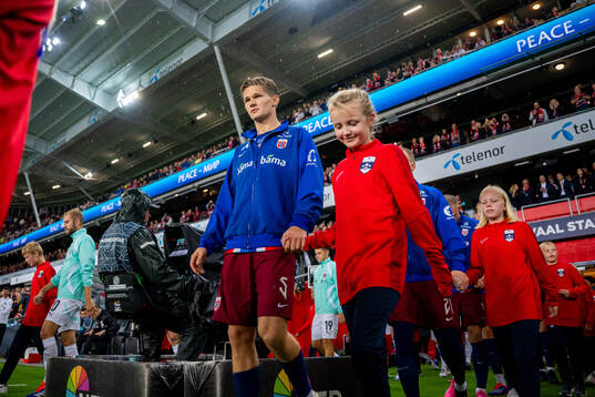 David Møller Wolfe of Norway enters the pitch