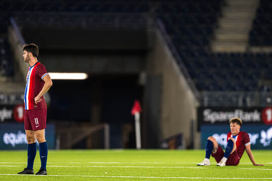 Lasse Selvåg Nordås of Norway looks dejected