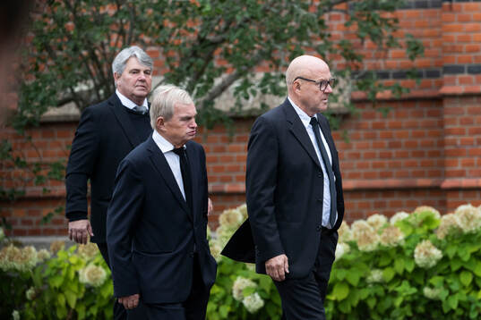 Thomas Wernerson (L), former football player and director,