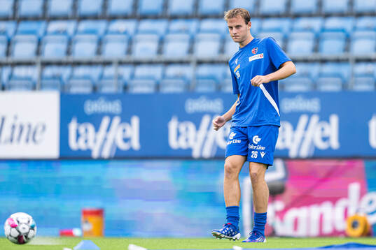 Filip Loftesnes-Bjune of Sandefjord warms up