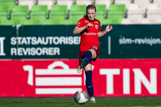 Maria Holtet of Norway warms up