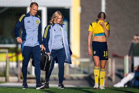 Thea Carlsson of Sweden with an injury