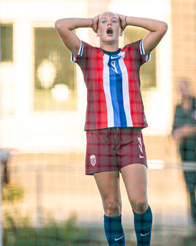 Marie Moen Preus of Norway looks dejected