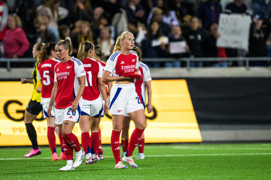 Laura Wienroither and Stina Blackstenius of Arsenal looks