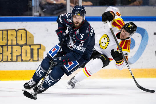 Linköpings Oscar Fantenberg och Brynäs Miks Indrasis