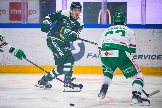 Rögles Filip Johansson och Färjestads Joakim Nygård