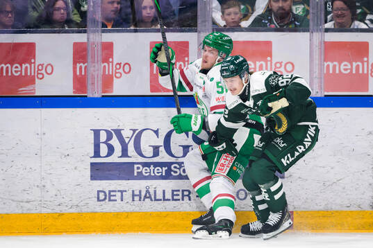 Rögles Filip Johansson och Färjestads Lucas Forsell