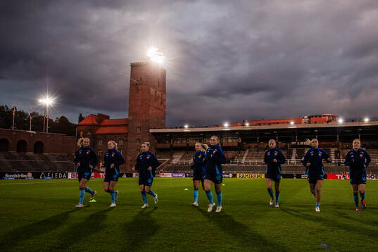 Stockholms Stadion med Djurgårdens spelare