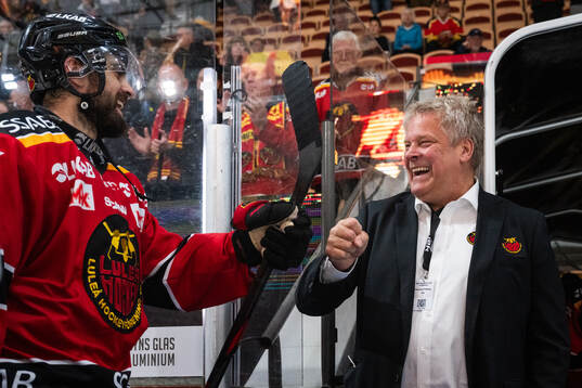 Luleås Frederic Allard och sportchef Thomas Fröberg jublar