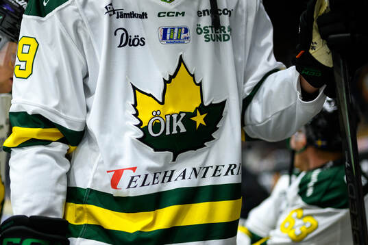 s (ÖIK) logotype på en tröja