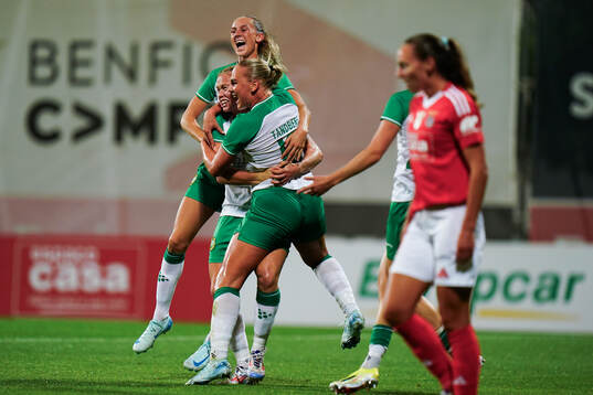 Julie Blakstad of Hammarby celebrates with team mates