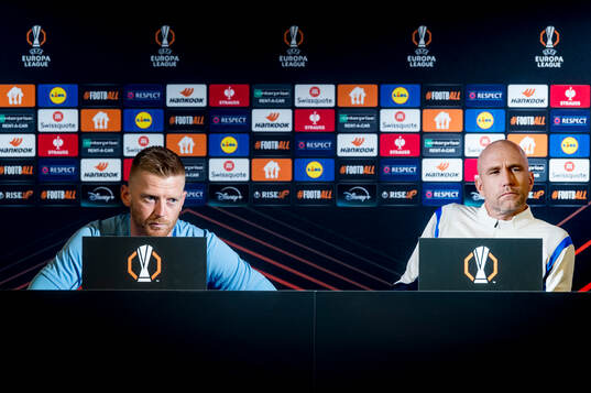 Anders Christiansen and head coach Henrik Rydström of