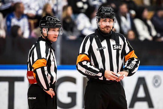 Domare Alexander Österberg och Domare David Laksola
