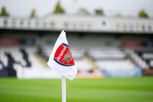 A corner flag with the Arsenal logo at Meadow Park