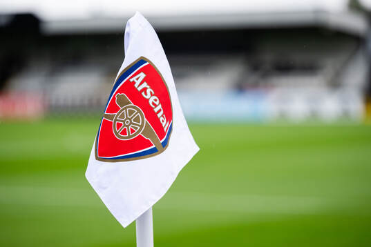 A corner flag with the Arsenal logo at Meadow Park