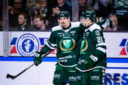 Färjestads David Tomasek och Per Åslund jublar