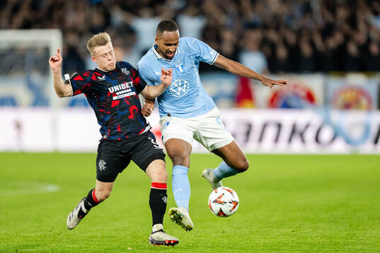 Connor Barron of Rangers and Isaac Kiese Thelin of Malmö FF
