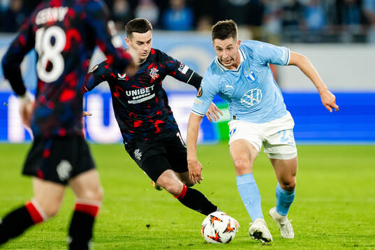 Thomas Lawrence of Rangers and Lasse Berg Johnsen of Malmö