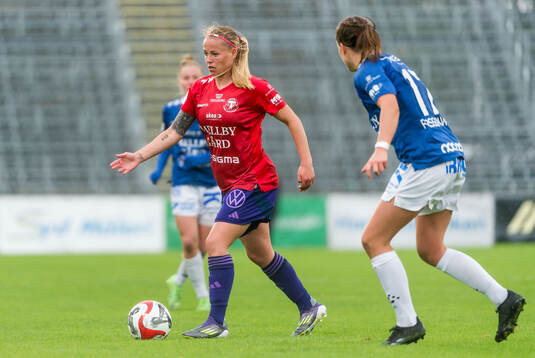 Djurgårdens Therese Åsland och Trelleborgs Erica Persson