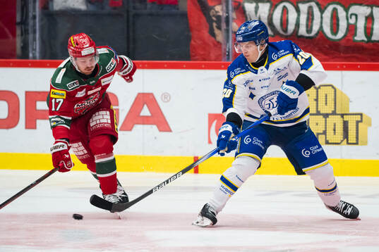 Leksands Axel Rindell och MoDos Riley Woods