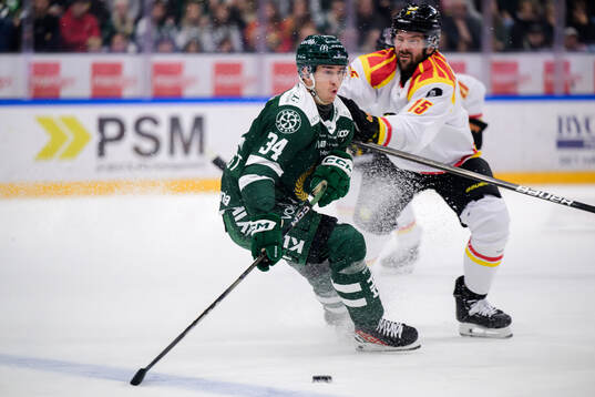 Färjestads Michael Lindqvist och Brynäs Simon Bertilsson