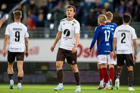Ole Amund Sveen of Mjøndalen looks dejected