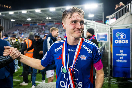 Christian Borchgrevink of Vålerenga celebrates promotion