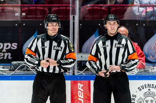 Domare David Laksola och Domare Linus Öhlund