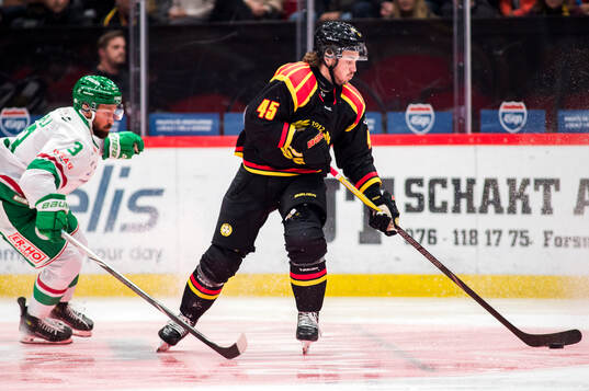 Rögles Michael Kapla och Brynäs Charles-Édouard D'astous