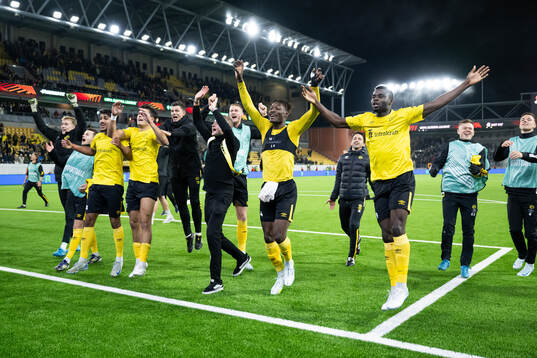 Players of Elfsborg celebrate in the stands