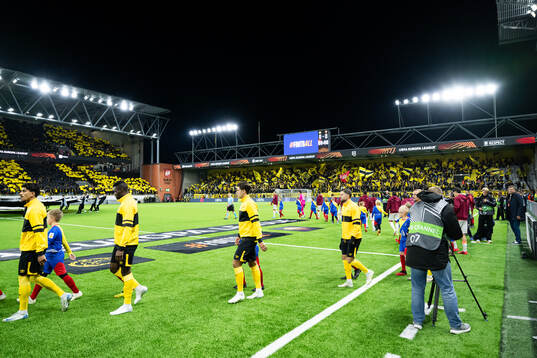 The teams enters the pitch