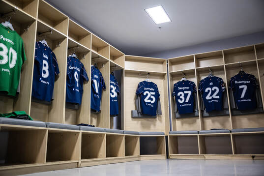 The kits of Malmö FF in the dressing room