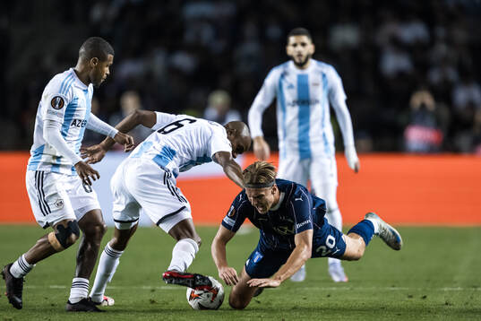 Erik Botheim of Malmö FF and Julio Romao of Qarabag