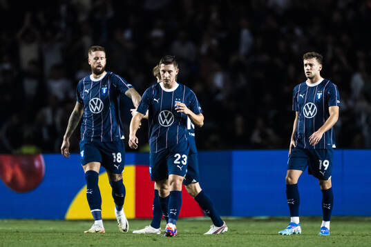 Lasse Berg Johnsen and Pontus Jansson of Malmö FF looks