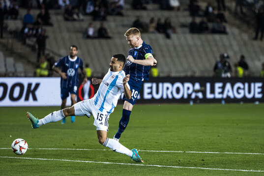 Leandro Andrade of Qarabag and Anders Christiansen of