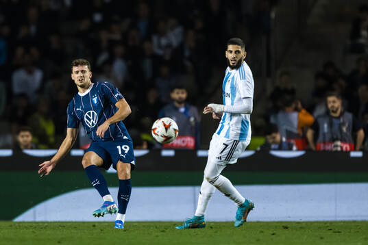 Colin Rösler of Malmö FF and Yassine Benzia of Qarabag