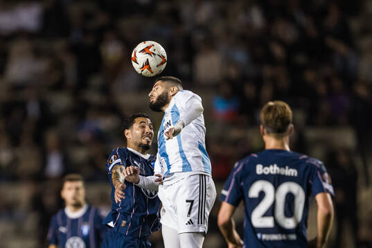 Sergio Pena of Malmö FF and Yassine Benzia of Qarabag