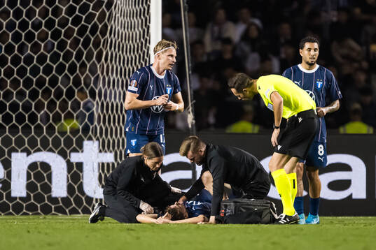 Colin Rösler of Malmö FF receives medical attention
