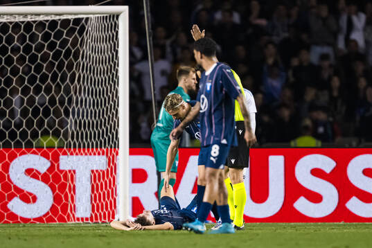 Colin Rösler of Malmö FF receives medical attention