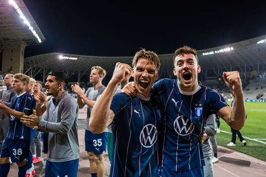 Jens Stryger Larsen and Colin Rösler of Malmö FF celebrate