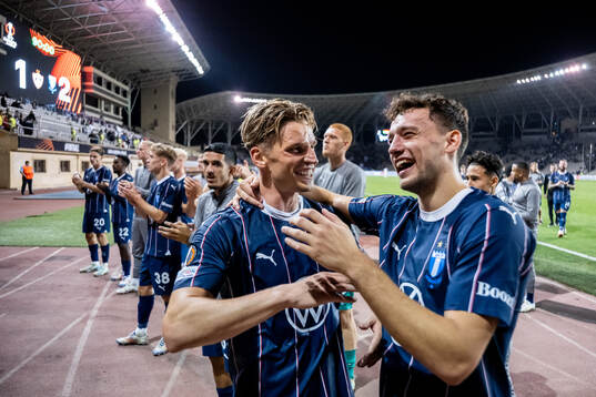 Jens Stryger Larsen and Colin Rösler of Malmö FF celebrate