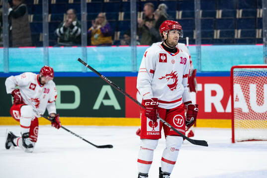 Adam Smith of Ocelari Trinec look dejected