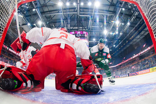 David Tomasek of Färjestad  shoots 1-0 behind goaltender