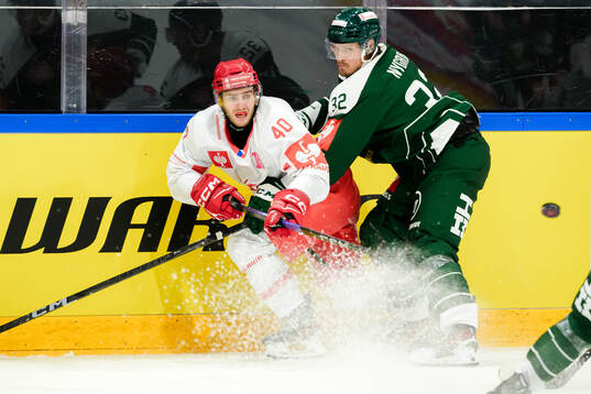 Milos Roman of Ocelari Trinec and Magnus Nygren of