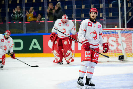 Adam Smith of Ocelari Trinec looks dejected
