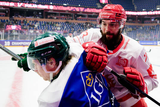 Oscar Steen of Färjestad  and Bohumil Jank of Ocelari