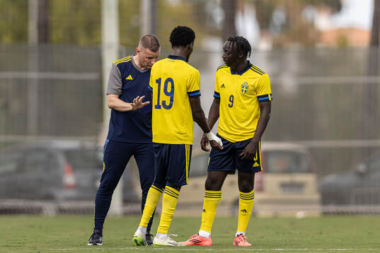 Head coach Andreas Pettersson, Nuurdin Ali Mohudin and