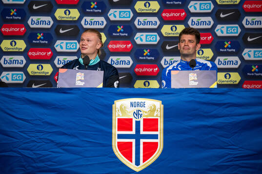 Erling Braut Haaland and press officer Morten Morisbak